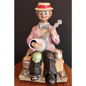 ANIMATED  “WILLIE PLAYING THE BANJO” BY MELODY IN MOTION. HAND MADE PORCELAIN